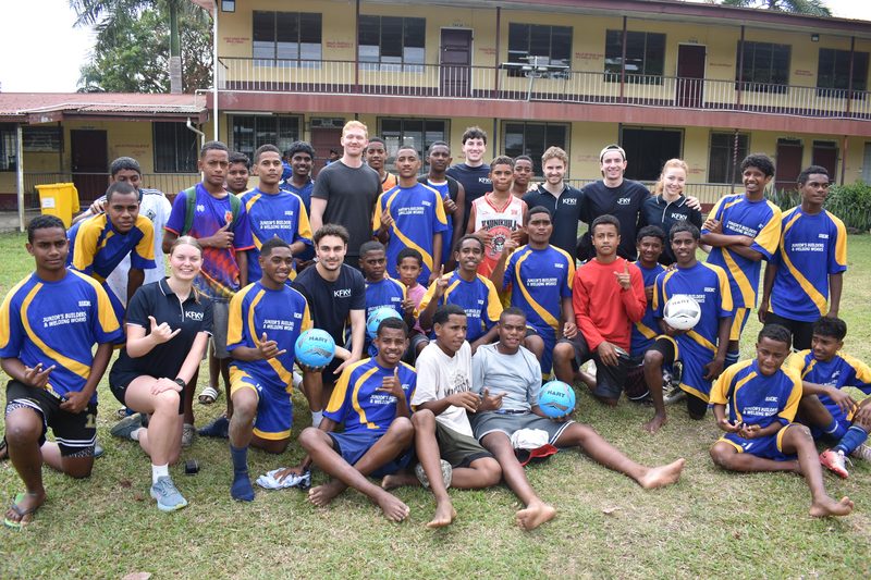 Fijian junior footballers with KFK volunteers