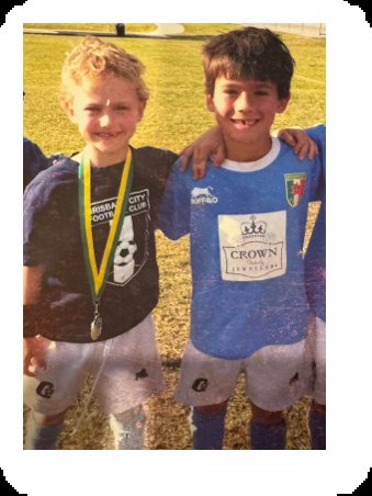 Nine-year-old Mac Millar with a teammate after a Brisbane City FC match
