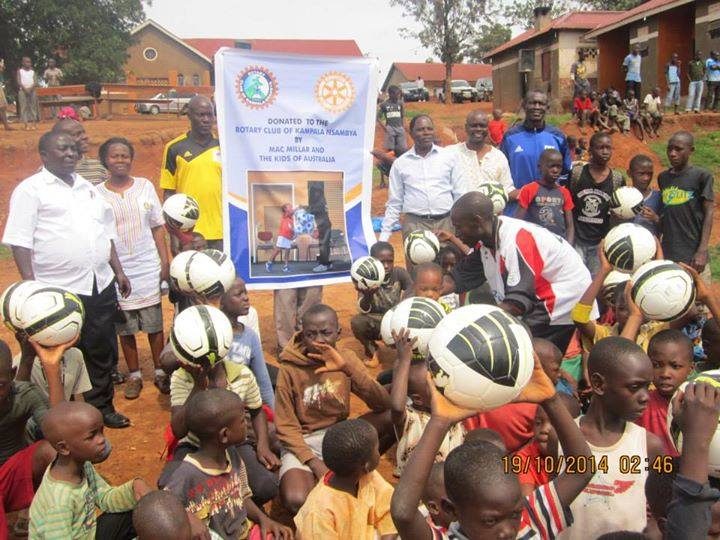 Ugandan children with donated soccer balls