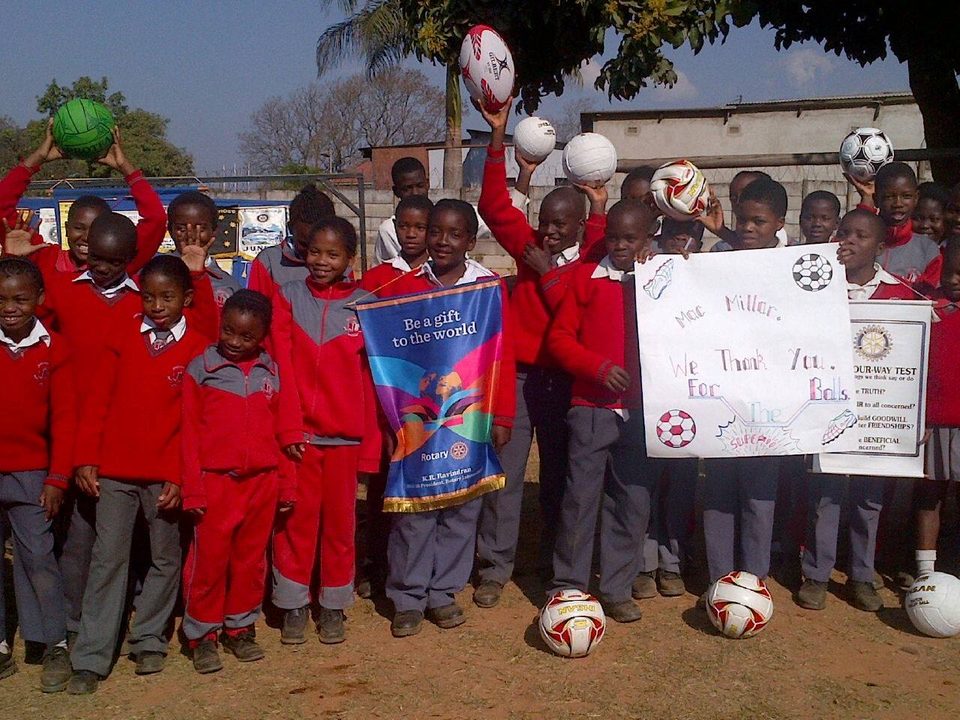 Zimbabwean school children with donated soccer balls